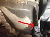 2004 Mazda3 front wheel side splash guards loose and flapping when driving-drivers-side.jpg