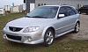 '02 Silver Protege5-front-3-qtr.jpg
